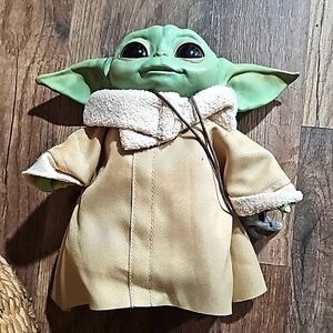 Baby Yoda Star Wars Figurine Motion and voice,the eyes opens and close